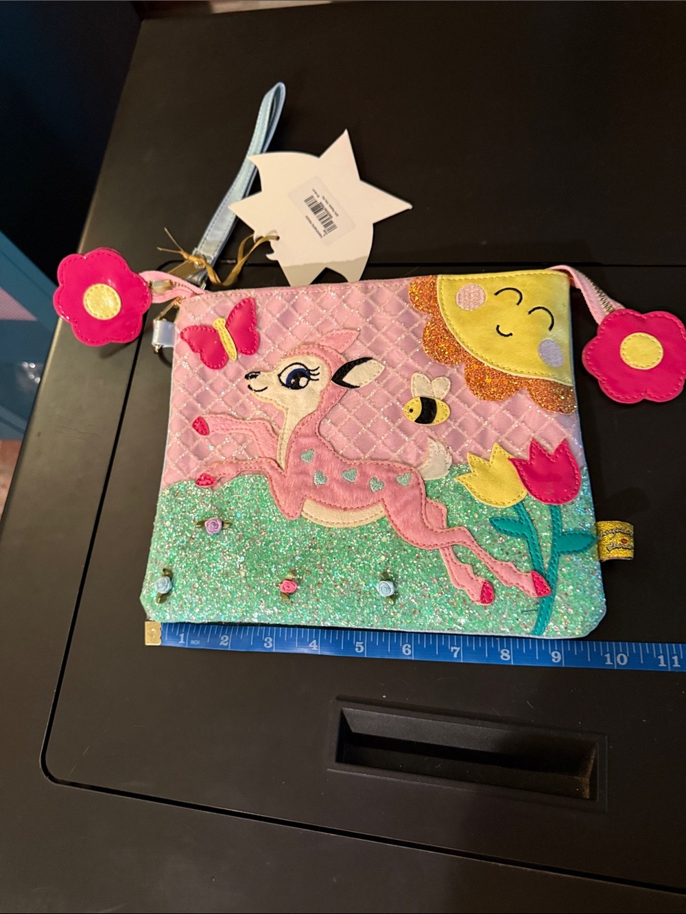Irregular Choice Pink Glitter Deer Wristlet with Floral Charms